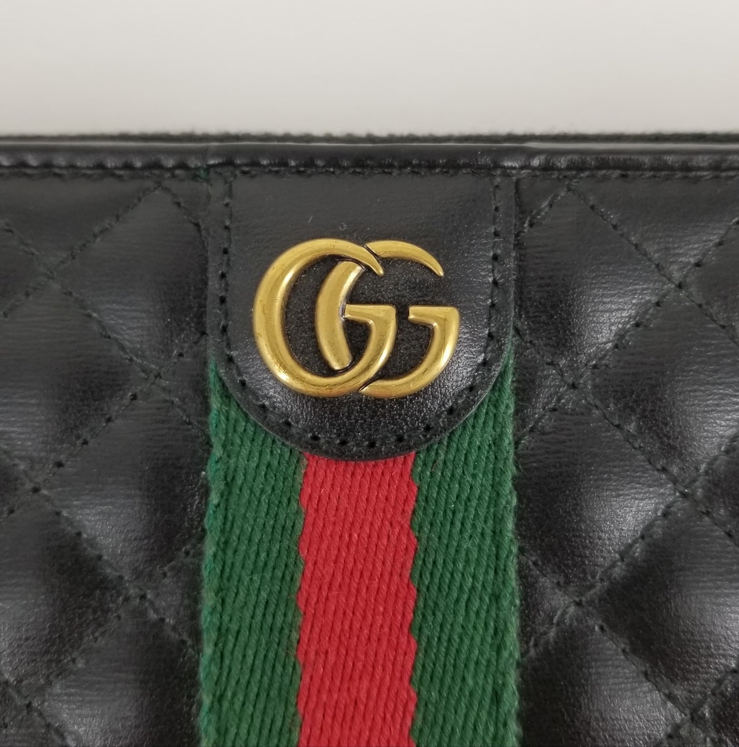 Authentic Gucci Quilted Black Vintage Stripe Zippy